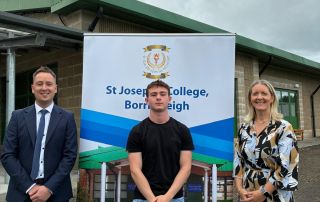 Image of school staff and student