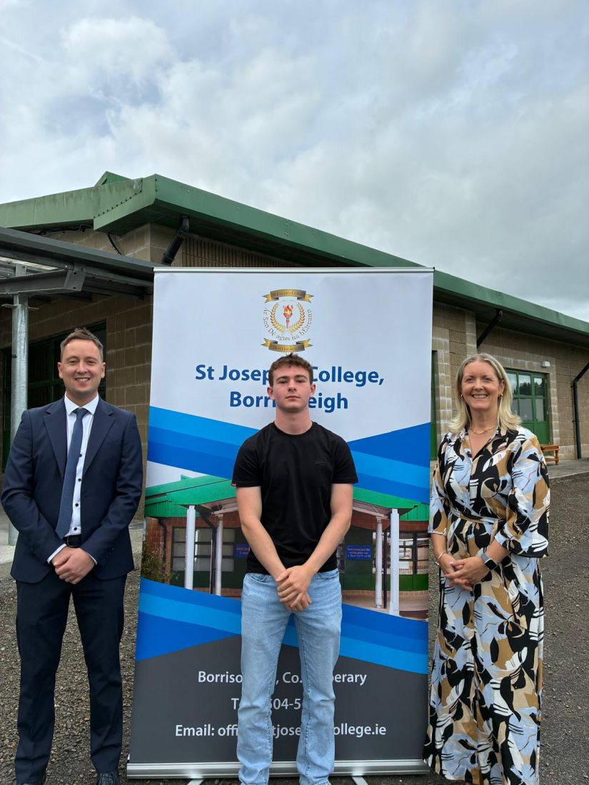 Image of school staff and student